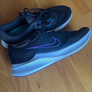 Nike Women’s size 12 Black and Purple Running Shoes